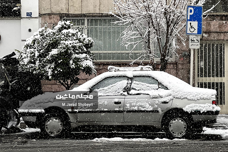 Snow and cars in Tehran 12
