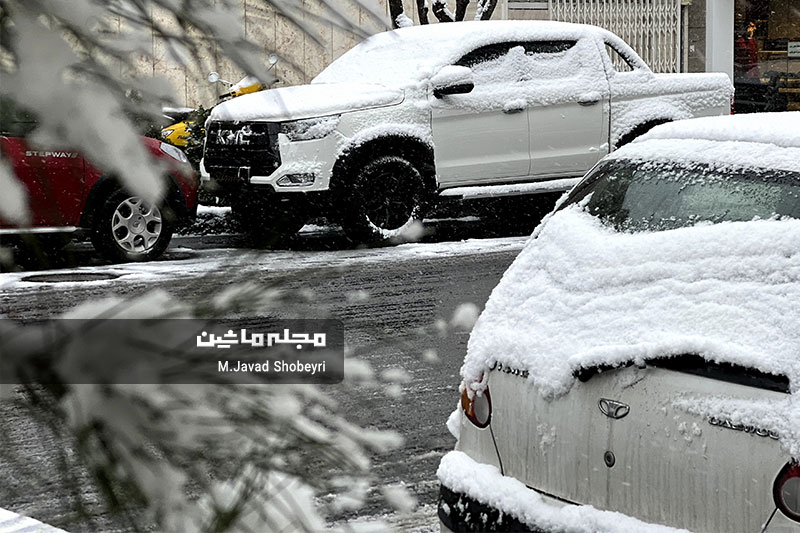 Snow and cars in Tehran 13