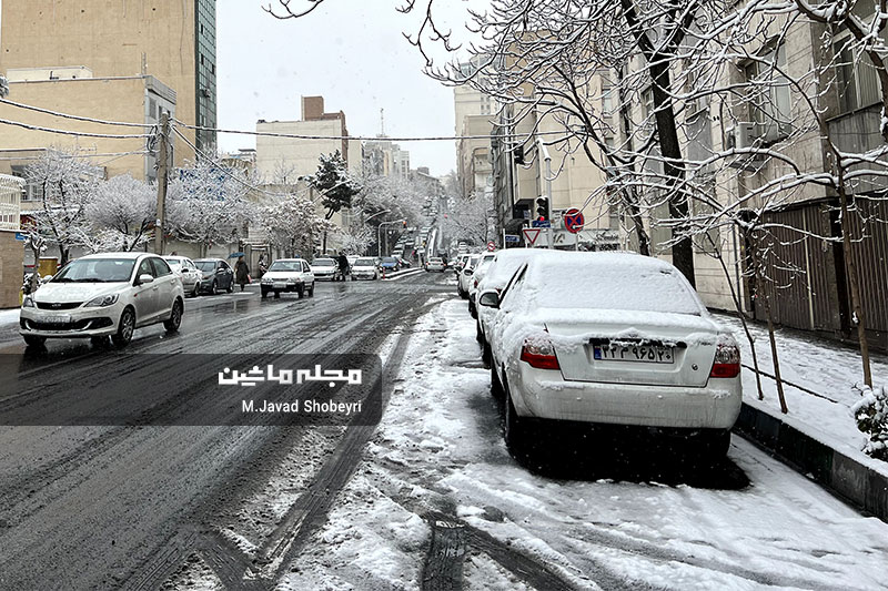 Snow and cars in Tehran 14