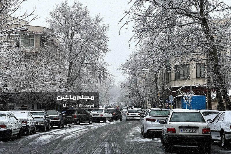 Snow and cars in Tehran 16