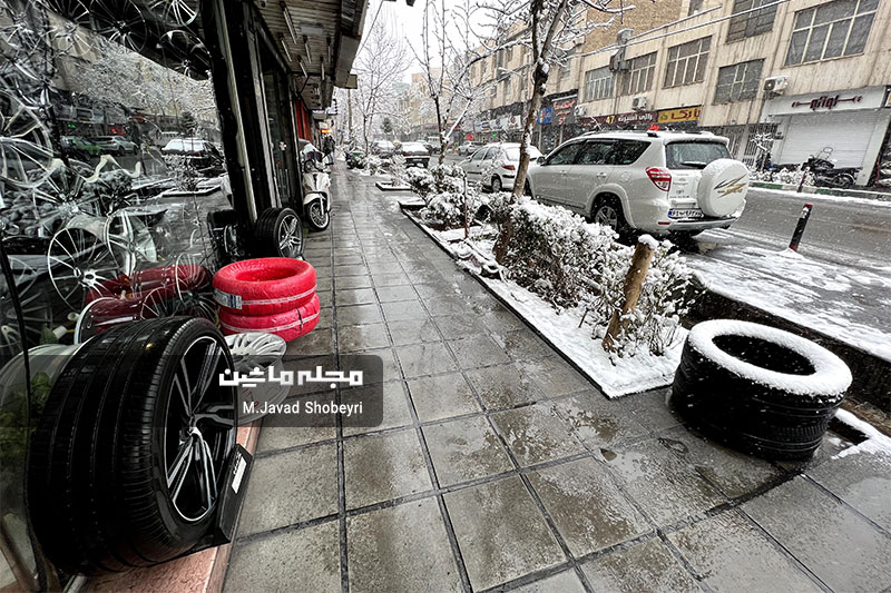 Snow and cars in Tehran 17