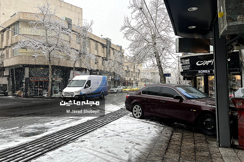 Snow and cars in Tehran 18