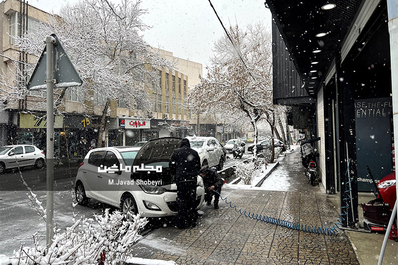 Snow and cars in Tehran 19