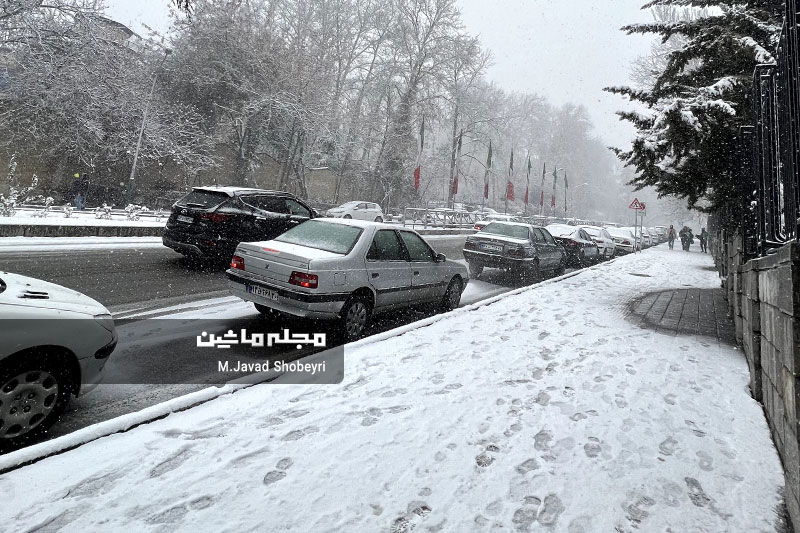 Snow and cars in Tehran 21