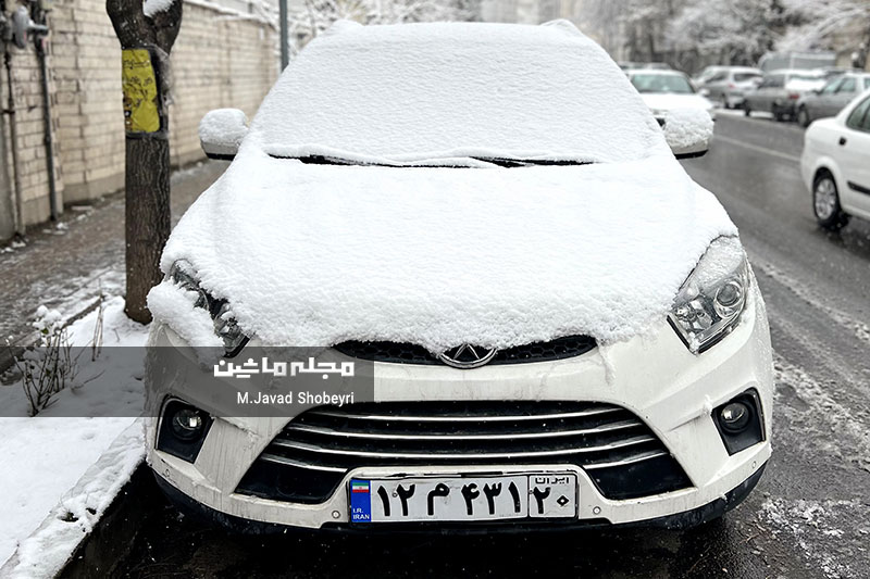 Snow and cars in Tehran 7