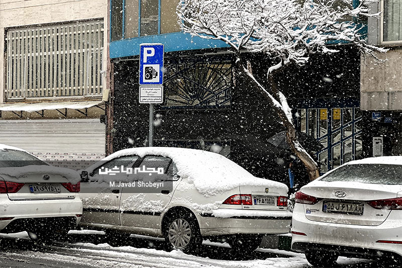Snow and cars in Tehran 9
